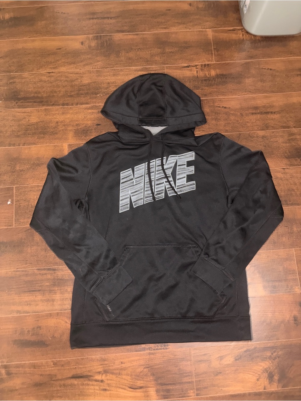 Nike Black Hoodie with Large Grey Striped Logo